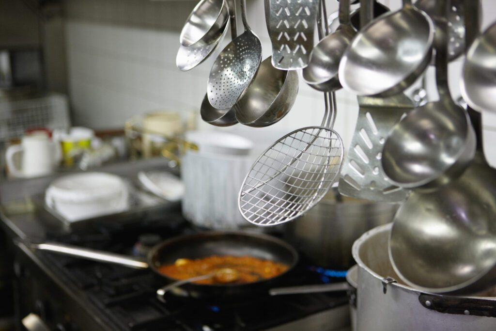 Close up of spoons in restaurant kitchen